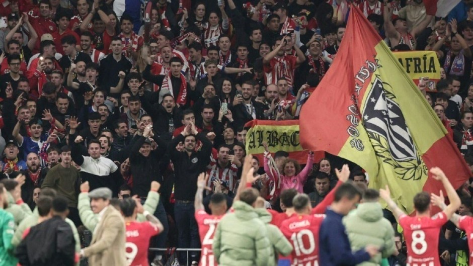 Atletico Madrid's players celebrate victory over Inter Milan in Madrid
