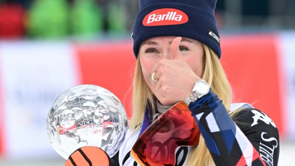 Thumbs up: Mikaela Shiffrin with her slalom globe after taking her World Cup tally to 97 