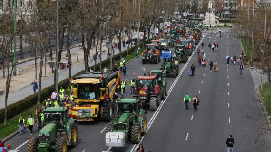 Protesting farmers drive tractors through central Madrid