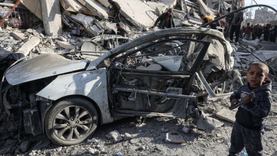 Palestinian homes destroyed by an Israeli air strike in Rafah, southern Gaza, on March 9