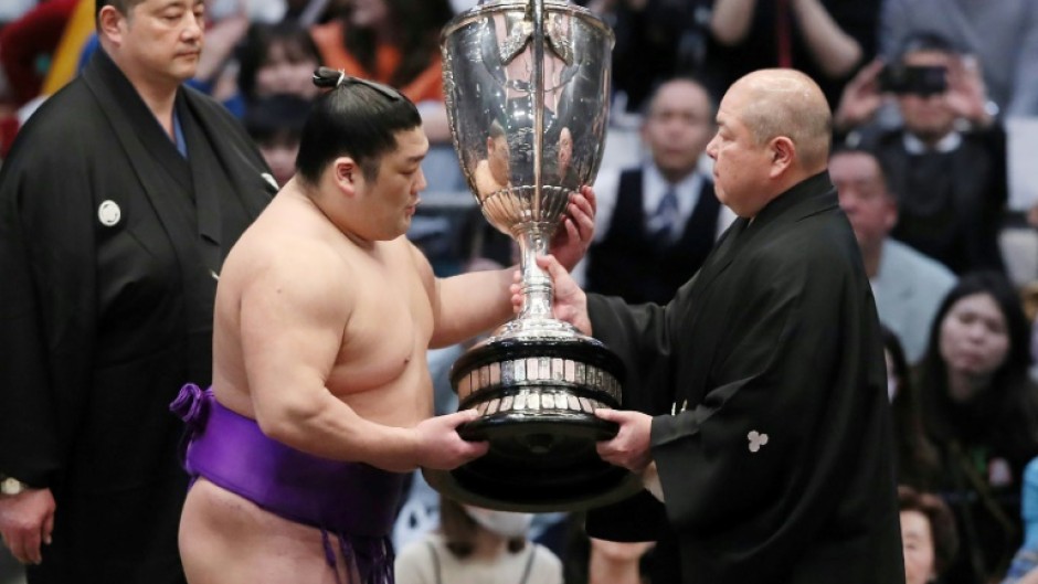 It is the first time since 1914 that a wrestler has won their first tournament in sumo's top "makuuchi" division