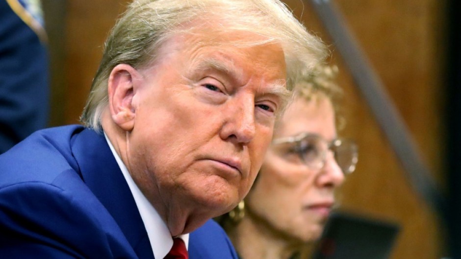 Former US president Donald Trump and one of his lawyers Susan Necheles in court for a pre-trial hearing in his New York 'hush money' case