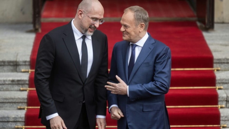 Ukrainian Prime Minister Denys Shmyhal (Ukrainian Prime Minister Denys Shmygal (L) said he hoped to have 'pragmatic and constructive' talks with Polish counterpart Donald Tusk (R)   L) said he hope to have 'pragmatic and constructive' talks with Polish counterpart Donald Tusk (R)   