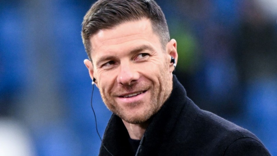 Xabi Alonso had been strongly linked to Liverpool but says he is staying at Bayern Leverkusen