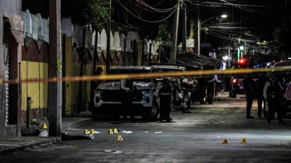 The body of Gisela Gaytan, candidate for mayor of the Mexican city of Celaya, lies on a street after she was gunned down while campaigning