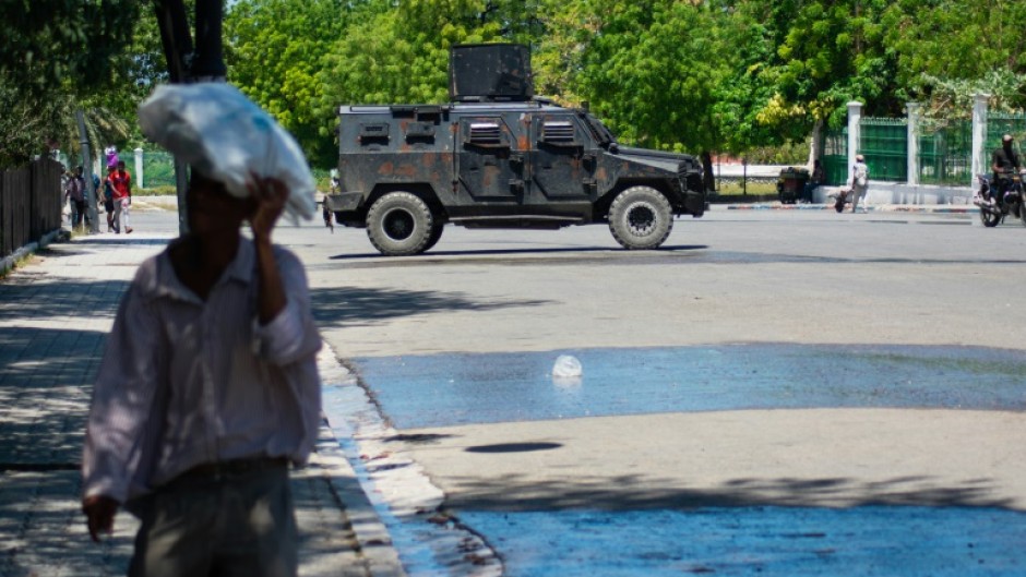 A police vehicle monitors the area near the National Palace in Port-au-Prince, Haiti, on April 2, 2024