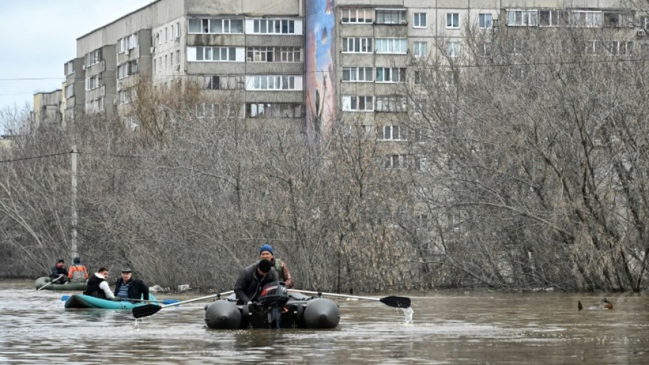 More than 10,000 residential buildings have been flooded in Russia's Urals and western Siberia