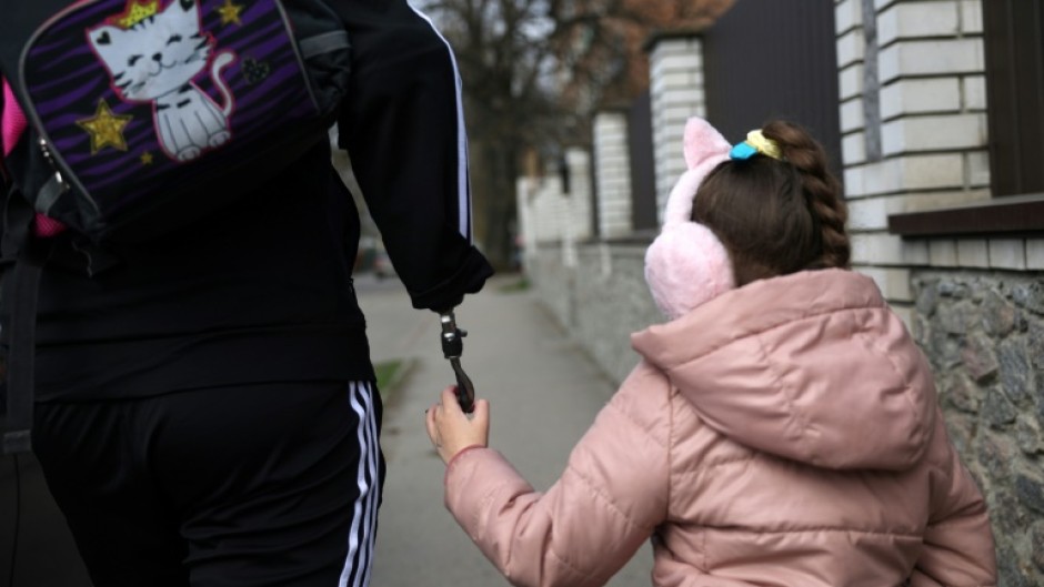 Kucherenko with his eldest daughter, six-year-old Valeria