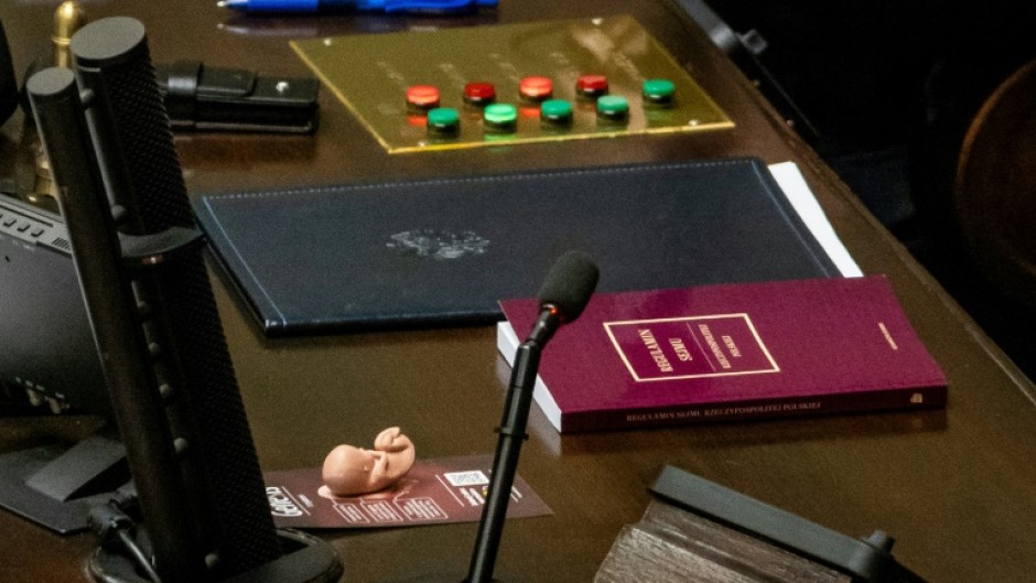 A small figure of a human foetus was seen on the desk of a conservative lawmaker of the Law and Justice (PiS) party during the vote on liberalising Poland's abortion laws