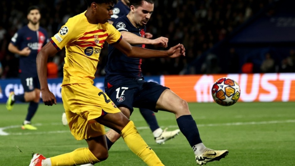 Barcelon forward Lamine Yamal (L) has burst into the limelight this season with dynamic performances on the right wing
