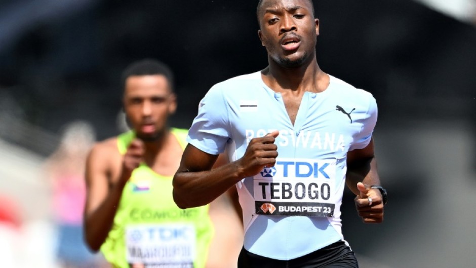 Letsile Tebogo leads a 200 metres heat during the 2023 world championships in Budapest.