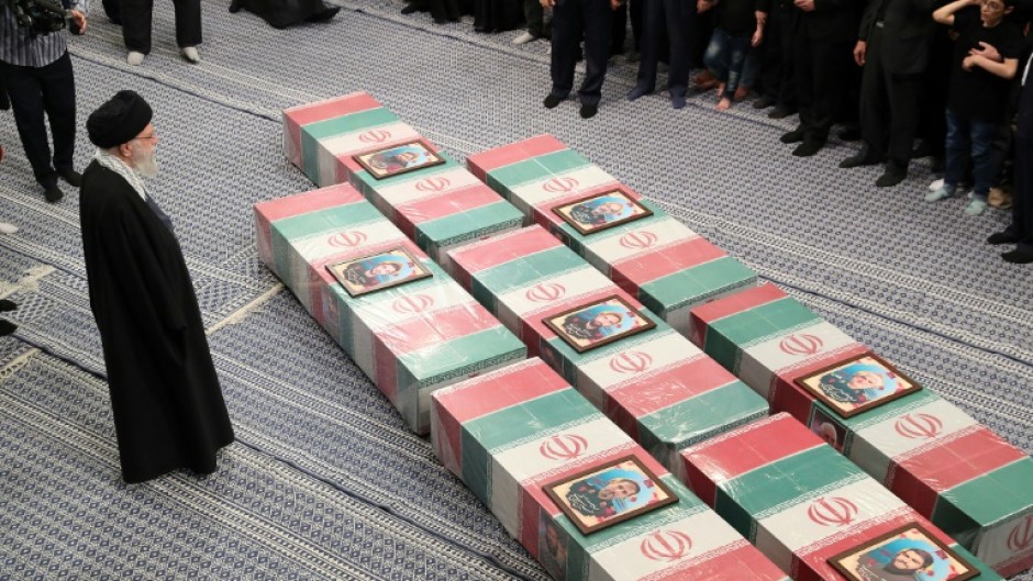 Iran's Ayatollah Ali Khamenei prays over the coffins of the seven Revolutionary Guards killed in the April 1 strike on its Damascus consulate