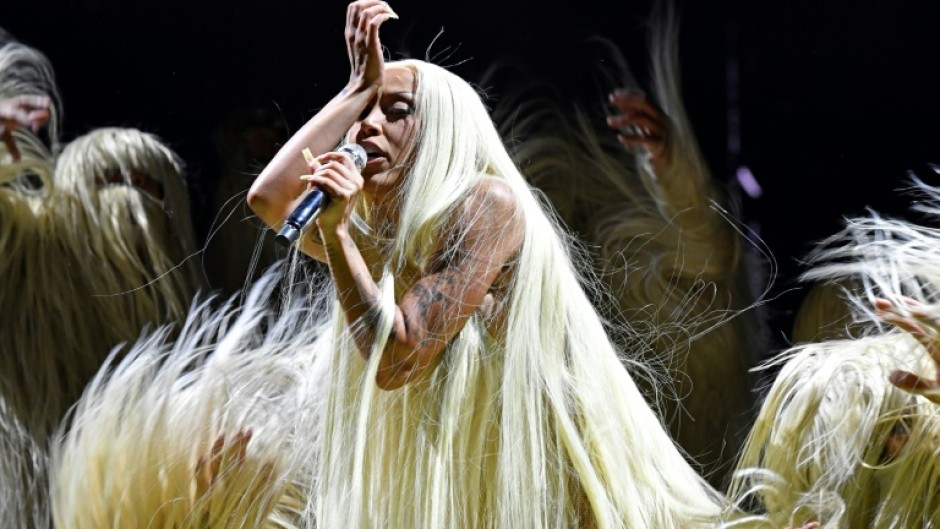 US singer Doja Cat's weird, sexy exclamation point of a performance was the crown jewel of a day that capped a weekend of powerful sets from stage-commanding women at the Coachella Valley Music and Arts Festival in Indio, California