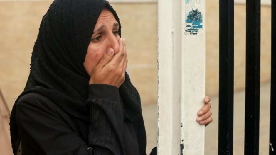 A Palestinian woman mourns the death of a loved one at Al-Najjar hospital following overnight Israeli bombardment in Rafah in the southern Gaza Strip on April 18, 2024