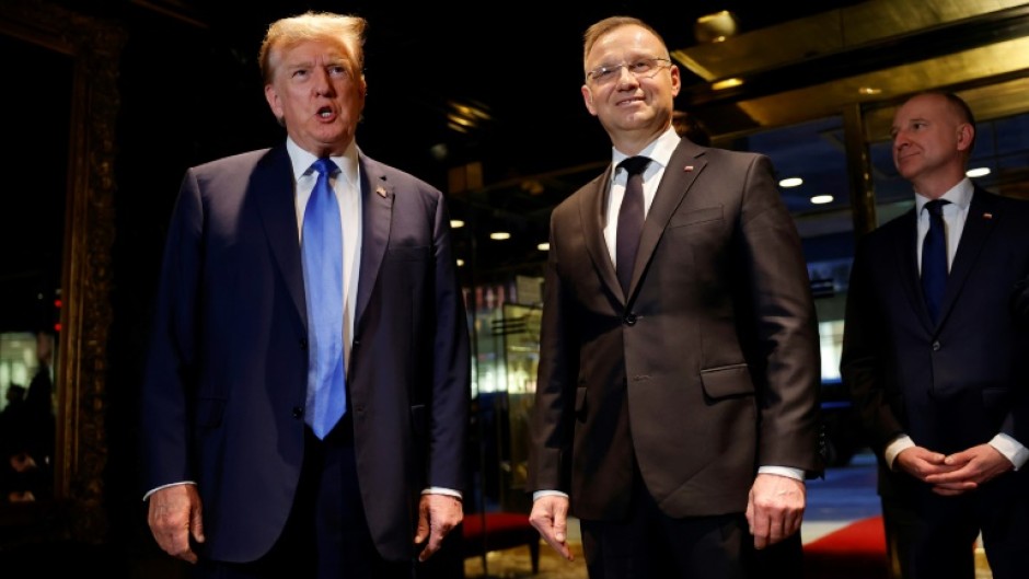 Donald Trump (L) met with Polish President Andrzej Duda at Trump Tower in New York, one in a series of meetings with foreign dignitaries as the Republican former US president campaigns for the White House in 2024