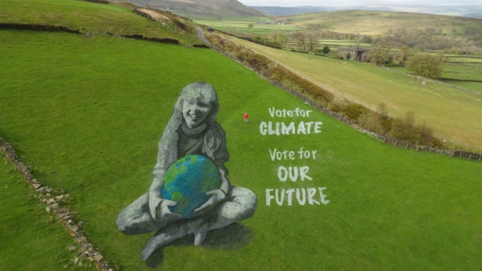 Artist Jamie Wardley created the painting for Earth Day to remind voters to consider the environment when they cast their ballots 