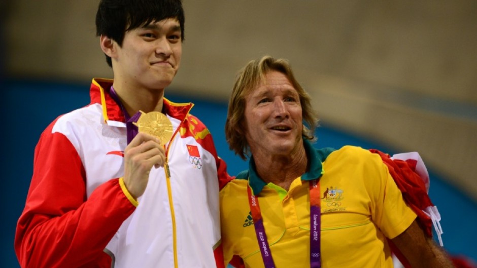 Australian coach Denis Cotterell (R) with Chinese swimmer Sun Yang
