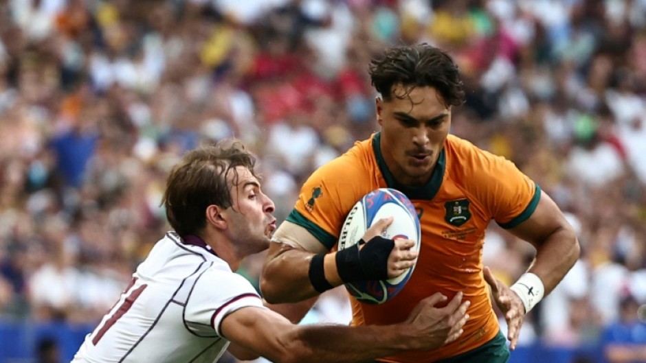 Wallabies star Jordan Petaia (C) will miss the rest of the Super Rugby season with a shoulder injury