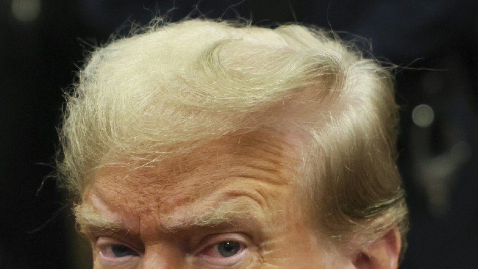 Former US president Donald Trump attends his trial for allegedly covering up hush money payments linked to extramarital affairs, at Manhattan Criminal Court in New York City on April 23, 2024