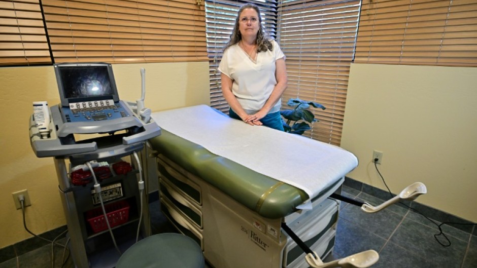 Gabrielle Goodrick, founder of Camelback Family Planning, poses at the clinic in Phoenix, Arizona on April 15, 2024