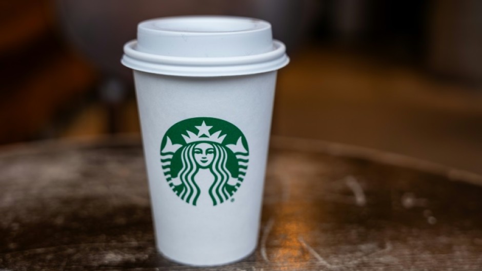 Starbucks reported weaker than expected profits, pointing to lackluster conditions in China and consumer caution in the United States 