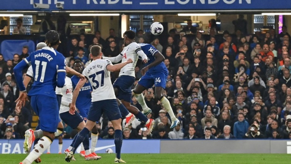 Chelsea's Trevoh Chalobah (R) scores against Tottenham