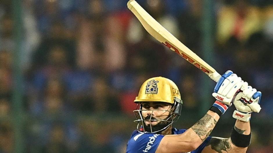 Starring role: Virat Kohli plays a shot on Saturday as Royal Challengers Bengaluru defeated Gujarat Titans