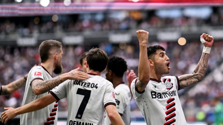 Exequiel Palacios celebrates scoring a penalty in Bayer Leverkusen's 5-1 win over Eintracht Frankfurt
