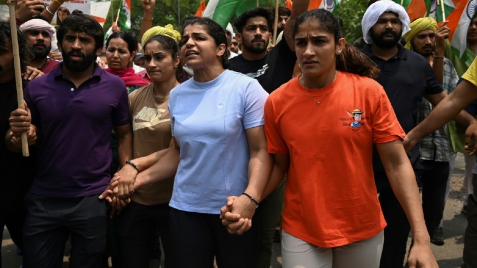 Bajrang Punia (left) joined wrestlers Vinesh Phogat, Sakshi Malik and Sangeeta Phogat on a protest march against the federation chief a year ago