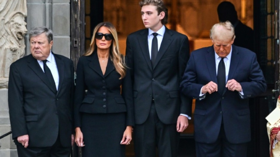 Barron Trump (2nd from right) is seen with his parents and grandfather in Palm Beach, Florida, in January 2024 during his grandmother's funeral