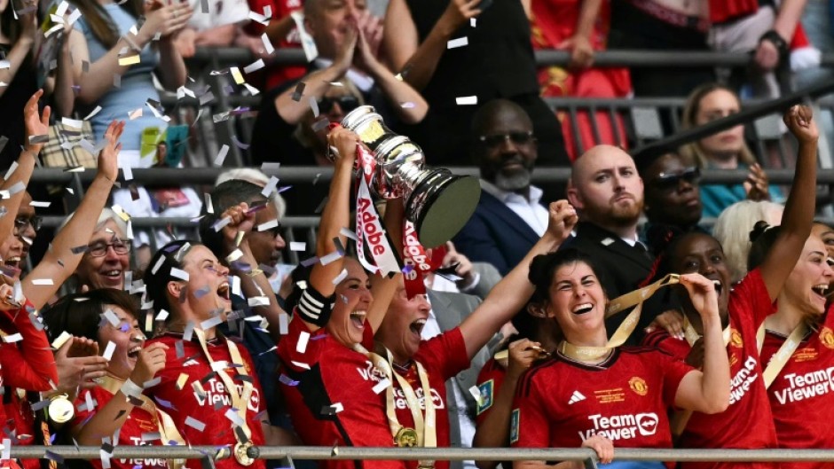 Manchester United celebrate winning the Women's FA Cup final against Tottenham