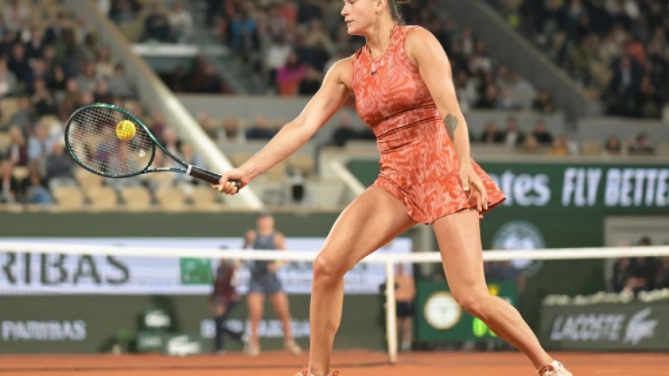 Fightback: Aryna Sabalenka plays a backhand return to Paula Badosa