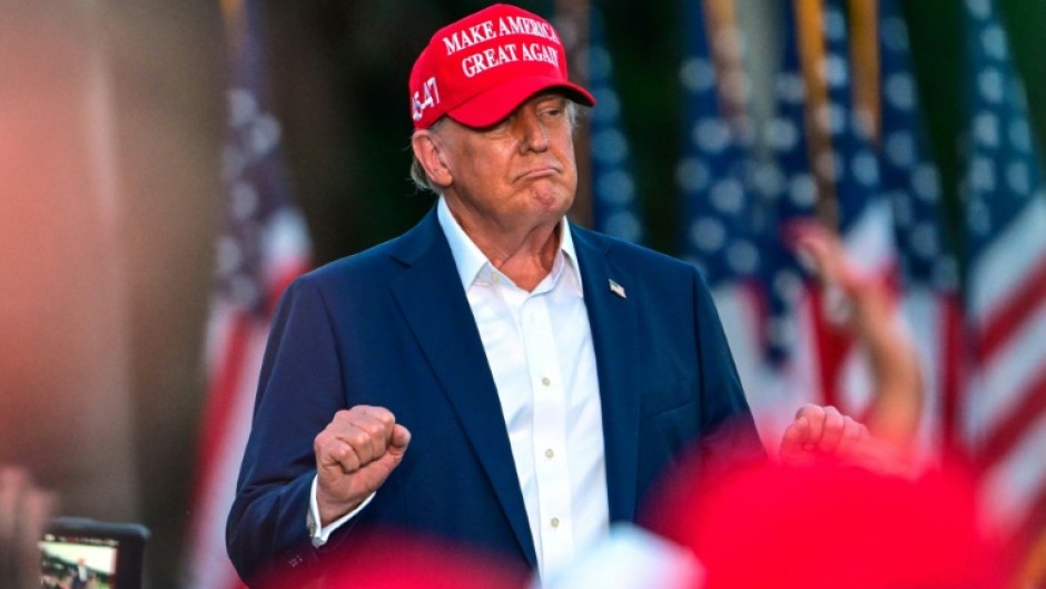 Republican presidential candidate Donald Trump gestures during a rally in Doral, Florida
