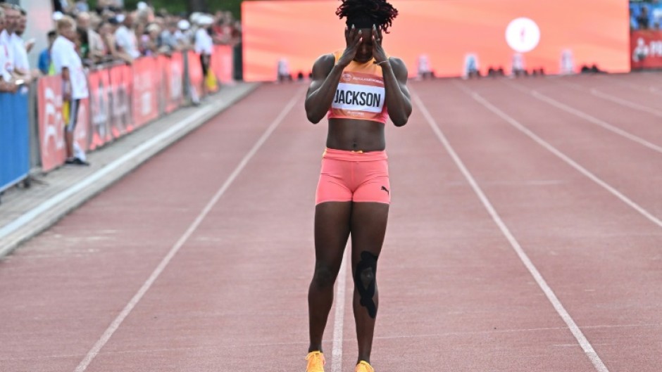 Jamaica's Shericka Jackson reacts after pulling up in a race in Szekesfehervar, Hungary on July 9