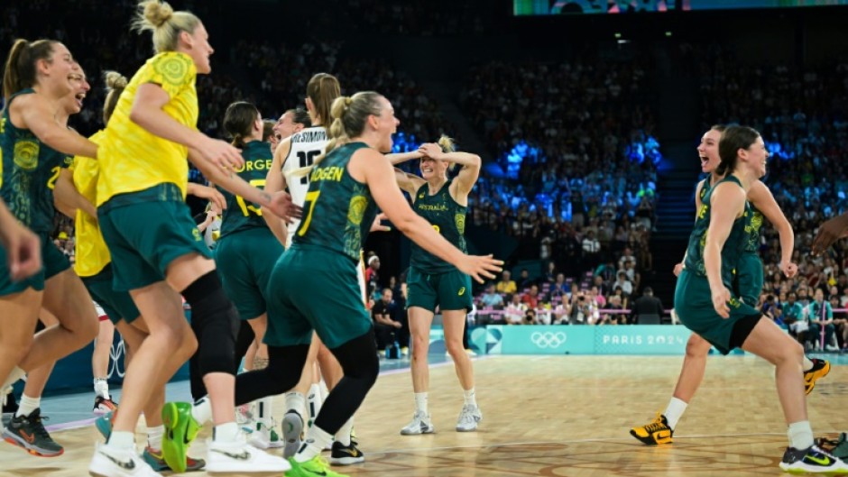 Australia players celebrate after beating Belgium for Olympic basketball bronze