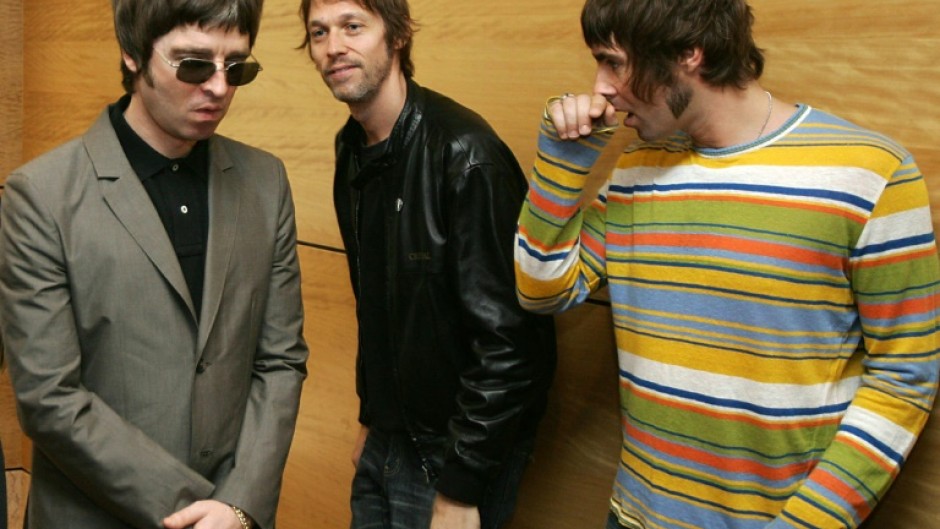 Back to their old tricks: Noel Gallagher (left), his brother Liam Gallagher (right) and bassist Andy Bell in 2006