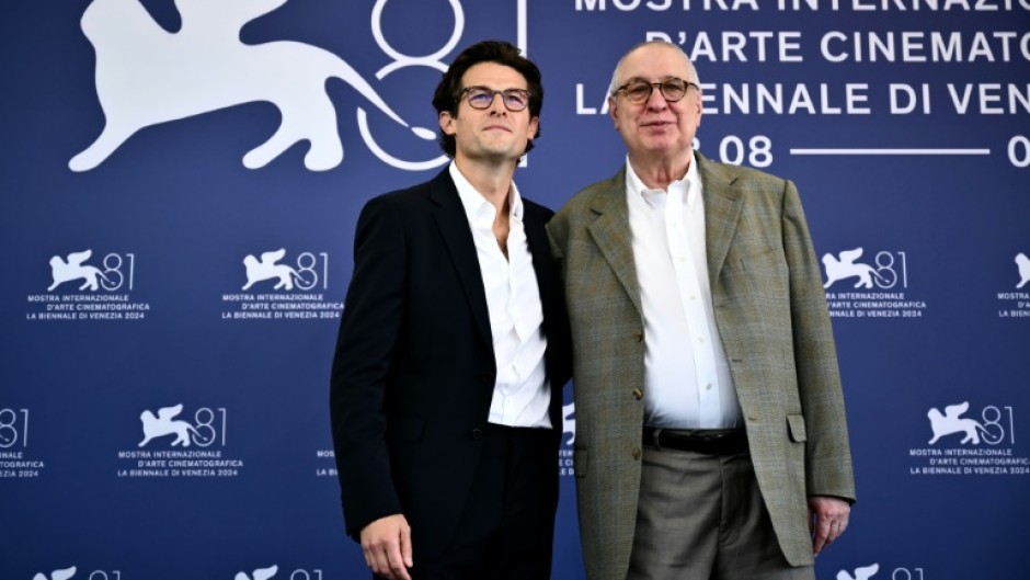 Legendary US documentary director Errol Morris (R) and US journalist Jacob Soboroff before the premiere of "Separated" at the Venice Film Festival