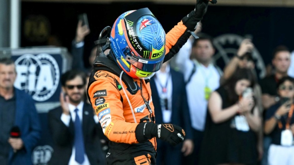 McLaren's Oscar Piastri celebrates his thrilling win over Charles Leclerc in Baku 