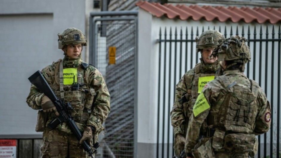 Danish military Police guard the   Israeli embassy in Copenhagen after two blasts went off nearby