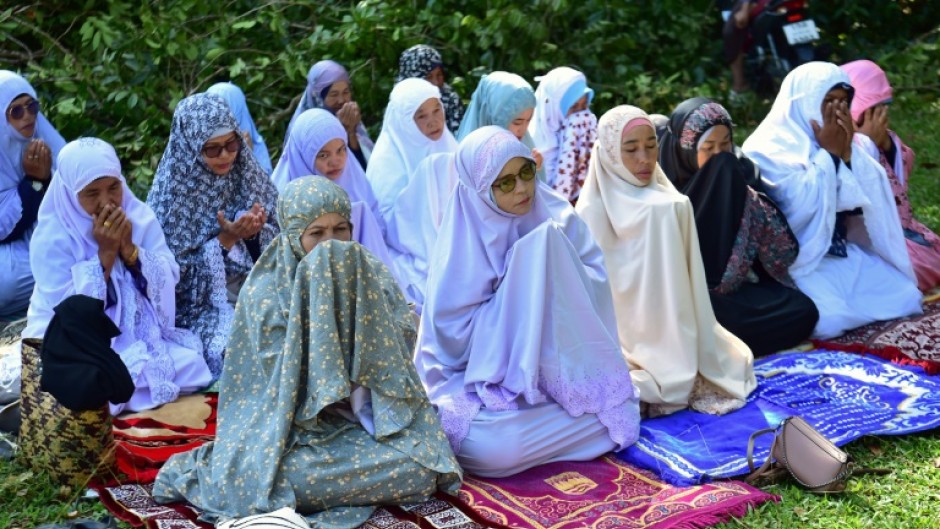 Around a hundred relatives, survivors and supporters gathered at the cemetery of a mosque in Narathiwat province on Friday morning to pray at a mass grave