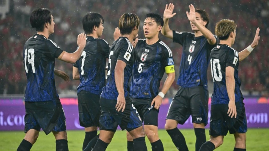 Japan hammered a hapless Indonesia side 4-0 on Friday, extending their lead at the top of qualifying for the 2026 World Cup