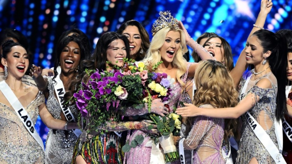 The newly crowned Miss Universe 2024, Victoria Kjaer Theilvig (C) from Denmark is a dancer and animal rights activist