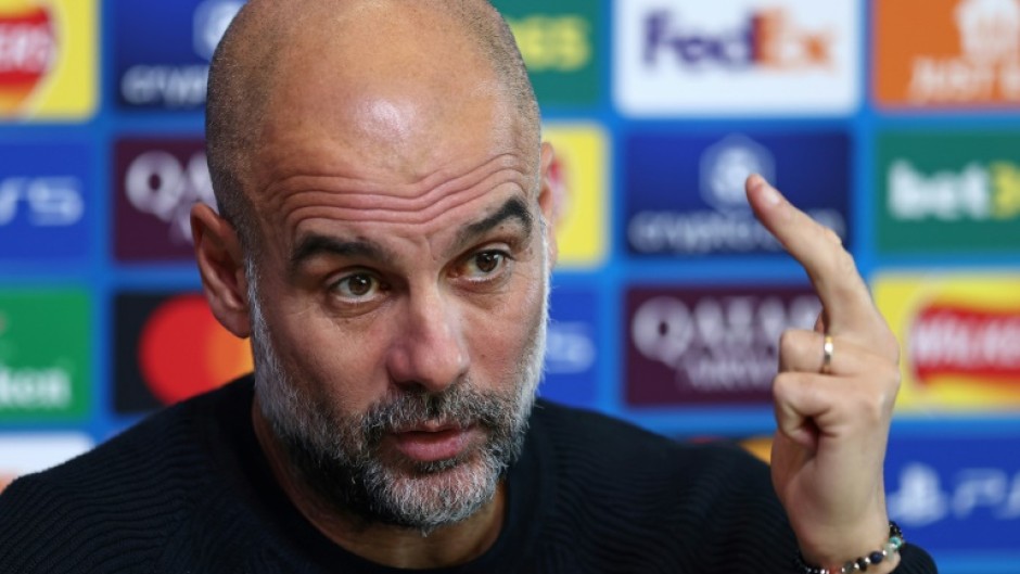 Manchester City manager Pep Guardiola speaks to the press ahead of his team's match against Feyenoord