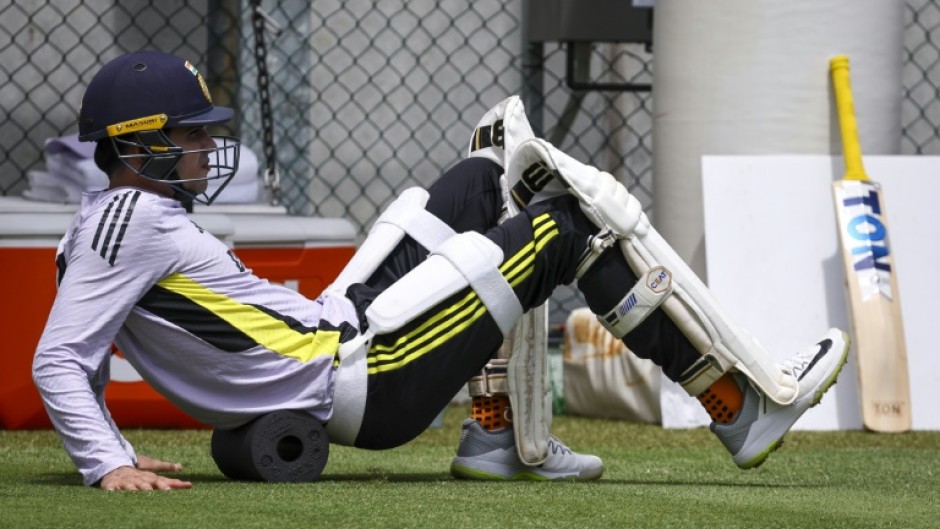 India's Shubman Gill stretches during a training session at The Gabba in Brisbane