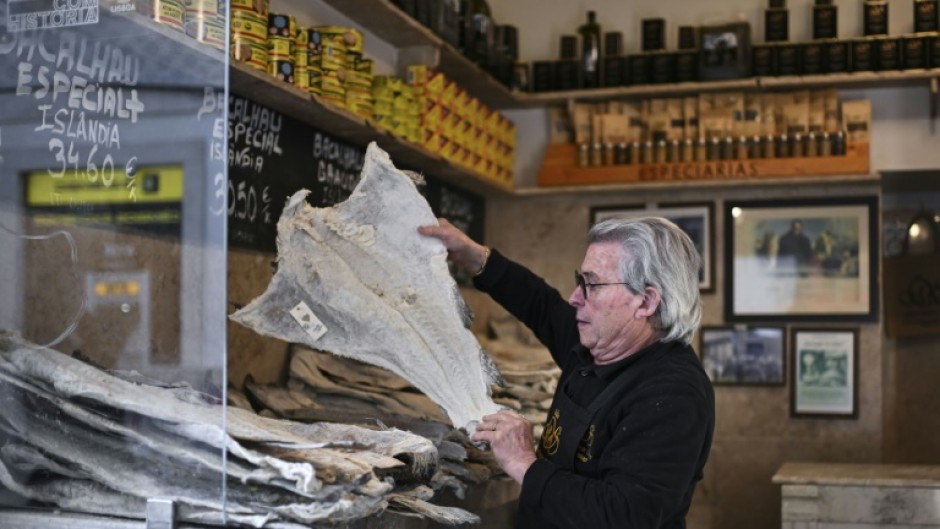 As Christmas approaches in Portugal supermarkets across the country prominently display hundreds of salt-encrusted cod piled high to be used in holiday meals