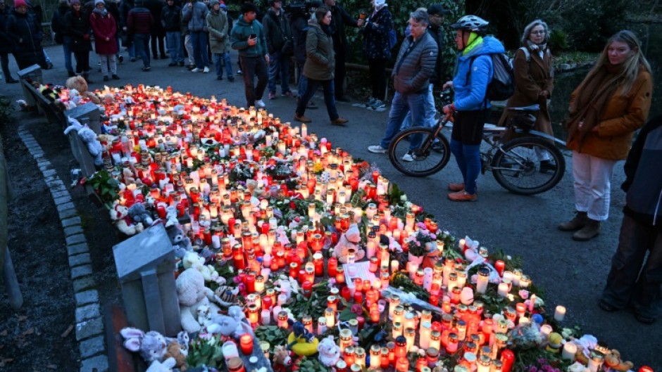 Mourners made a makeshift memorial for the victims of a knife attack in Aschaffenburg
