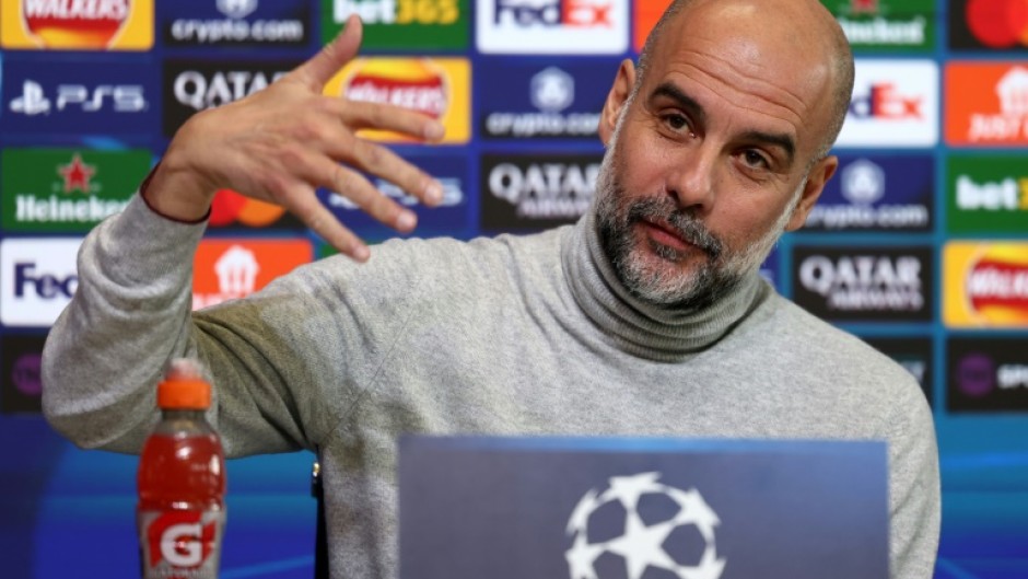 Manchester City manager Pep Guardiola speaks at a press conference ahead of his side's Champions League match against Club Brugge