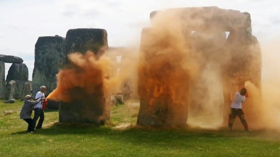 Two activists are accused of throwing orange paint powder at Stonehenge