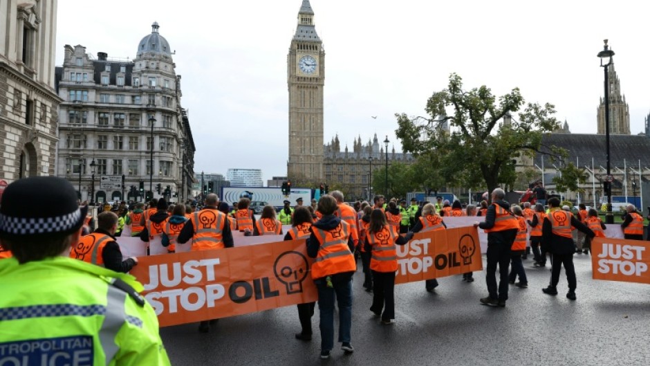 A Just Stop Oil slow march to disrupt traffic in Parliament Square in London in October 2023