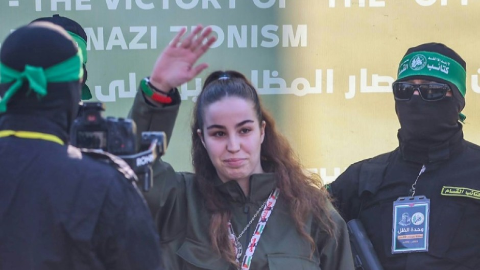 In a photo released by the Israeli military, freed Israeli hostage Agam Berger is reunited with her parents after her release by Hamas militants in the Gaza Strip